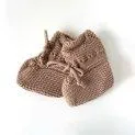 Knitted booties with ribbons rose